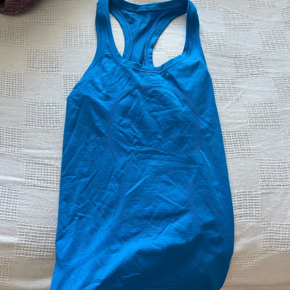 NEVER WORN, lululemon Swiftly Tech Racerback Tank Top 2.0
Hip Length - Picture 2 of 3